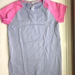 purple and pink ivivva short sleeve shirt